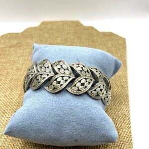 Silver Articulated Leaf Pattern Bracelet Signed Judy Lee fold over clasp closure